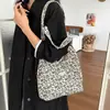 Bolso tote de leopardo elegante transfronterizo gran capacidad estilo perezoso lona bolsa casual mochila para estudiante mujer para ir al trabajo mochila escolar