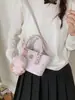 Bolso Cubo Estilo Japonés y Coreano con Estampado de Dibujos Animados para Mujer 2026 Nueva Moda Bolso de Hombro Cruzado Versátil para Viajes Casuales