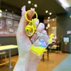 Nuevo llavero de bubble tea oso de leche pequeño flotante botella de arena movediza líquida adorno colgante de regalo para pareja bolsa de regalo adornos colgantes para mujer