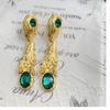 Pendientes largos vintage "El Cetro de la Reina" con gemas doradas lisas y baño de oro auténtico, línea flotante en plata 925.