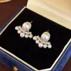 Pendientes de Perlas Barrocas de Imitación de Alta Gama, Pendientes de Lujo Nicho con Lazos y Diamantes Brillantes, Pendientes de Nuevo Estilo Popular 2026