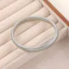 Pulsera europea y americana de aleación de tres capas enrollada en hueso de serpiente de un solo anillo viento frío pulsera simple personalidad borde ancho pulsera de resorte