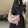 Bolso de lona popular para mujer de este año 2024 nuevo para estudiantes universitarios clase viaje al trabajo bandolera de alta gama versátil bolso dumpling
