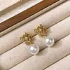 Pendientes de Diseño de Nicho de Alta Gama Estilo Francés Personalidad de Mujer Colgante de Perla Familia Luo Pendientes Retro Pendientes de Alta Gama