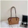 Bolsa de Mão Simples Casual Retro Estilo Coreano Shuai Mijia 2026 Nova Bolsa de Ombro Texturizada com Grande Capacidade para o Trabalho