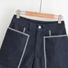 Venta al por mayor transfronteriza 2026 Moda europea y americana shorts vaqueros de cintura alta de pierna ancha con decoración de bolsillo para mujer M226419