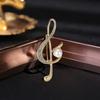 2026 Nuevo Broche de Nota Musical Simple Corsage de Verano Accesorios para Ropa Fuente de Fábrica Pasador de Seguridad Anti-Exposición Venta al por Mayor