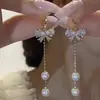 Pendientes de Trébol de Lujo Ligero 2026 Nuevo Modelo Nicho Gama Alta Borla Pinzas para Orejas Galvanizadas para Mujer Otoño e Invierno Pendientes Elegantes