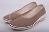 Zapatos de Enfermera de Marca de Una Palabra para Mujer Tacón de Cuña Blanco Suela Suave Nuevos Zapatos Blancos 2025 Zapatos de Tela Old Beijing Otoño e Invierno Planos