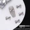Accesorios Populares Transfronterizos para Uñas Piedra Gema K Blanca Corazón Lazo Pedrería Rosa Decoraciones para Uñas Venta al por Mayor