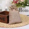 En stock tela imitación lino bolsa de bolsillo de texto pulsera de juego bolsa de embalaje de almacenamiento bolsa de almacenamiento de carga para auriculares bolsa antipolvo para joyas
