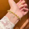 Pulsera Popular Retro de Flor de Iris de Xiaohongshu para Mujer, Lujo Accesible Nicho de Gama Alta Ojo de Gato Versátil Zirconia Nuevo Estilo