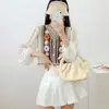 Ropa de punto calada de dos piezas falsas estilo bohemio para mujer, camisa de gasa de manga larga, camisa de verano protectora contra el sol, cárdigan de cuello en V, abrigo corto