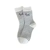Calcetines JK, diseño lindo de cachorro, longitud media hasta la pantorrilla, con diseños de rayas y lunares, adecuados para otoño e invierno, estilo de dibujos animados, para estudiantes y niñas jóvenes, hechos de algodón