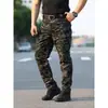 Calças Táticas Ix5 Masculinas para Uso Externo Corte Amplo Múltiplos Bolsos Resistentes ao Desgaste Calças para Tarefas Especiais Calças de Trabalho Masculinas Multiuso Camuflagem Cp