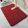 Directamente del fabricante, alfombrilla de suelo de forro polar coral con relieve de guijarros, alfombrilla de baño antideslizante y absorbente, fácil de mantener, felpudo para puerta de baño