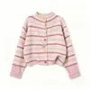 Conjunto de cárdigan de punto a rayas para niñas de primavera y otoño con jeans de pierna ancha de cintura alta, un conjunto de dos piezas elegante y moderno para niños mayores
