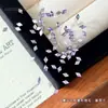 Rhinestones cúbicos de circonia con forma de rombo plano para decoración de uñas, un diseño popular y moderno con patrones de copo de nieve y bordes biselados, para decoración de uñas