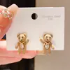 Brincos de Urso Filhote com Laço de Zircônia Eletrodepositados em Ouro Real 18K Luxo Acessível High-End Outono e Inverno Brincos de Desenho Animado