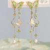 Pendientes de mariposa con circonitas y diseño de nicho, con nombre de flor inaudito. Pendientes largos con borlas para mujer.