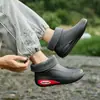 Botas de chuva curtas transfronteiriças masculinas antiderrapantes impermeáveis novos sapatos de moda para exterior botas de água botas de chuva forradas com lã sapatos de borracha masculinos atacado