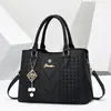 Bolso grande de mano simple y elegante, bolso cruzado casual y moderno, bolso de hombro versátil de nicho para mujer, bolso de mujer transfronterizo