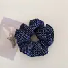 Goma de pelo de estilo coreano perezoso con lunares azul marino para mujer, accesorio para el pelo retro elegante y versátil para moño