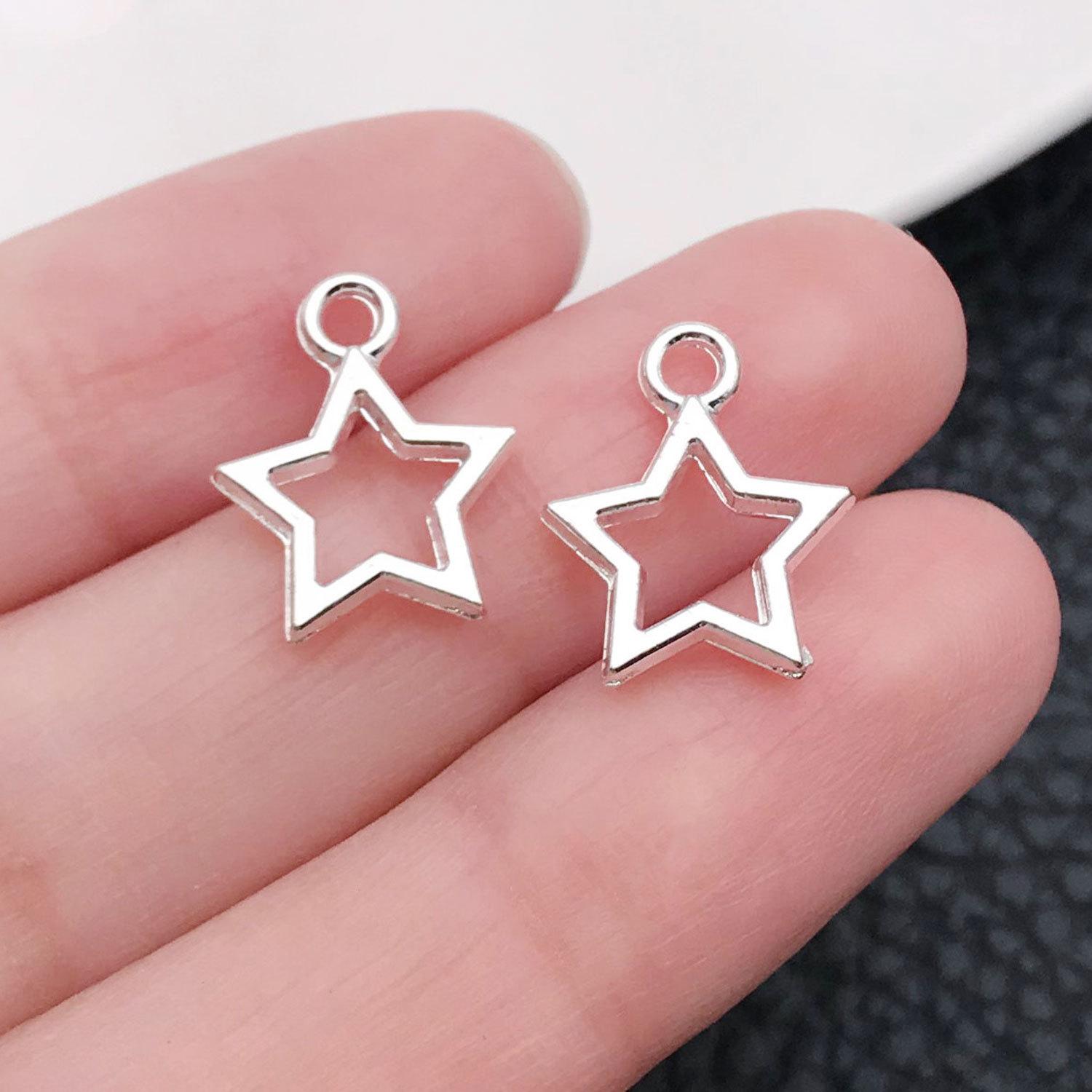 20848-M-亮银锌合金镂空五角星12x14-0.57g.