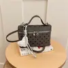 Bolso pequeño cuadrado tipo caja INS estilo coreano para mujer, bandolera individual, bolso de mano de lunares elegante popular este año, bolso tote pequeño, transfronterizo