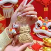Llavero Dorado Estilo Chino Danza del León Cadena para Teléfono Mascota Colgante para Bolso Decoración Tendencia Nacional Evento Regalo Mayoreo