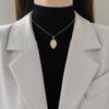 [Acero titanio] Collar de diamantes de imitación con figura de loto, lujoso y elegante, cadena de clavícula para mujer, combinable con todo, de acero titanio.
