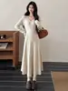 Vestido de Punto de Manga Larga con Cuello en V Estilo Suave Nuevo Otoño/Invierno para Mujer Vestido Base Suéter de Cintura ceñida Estilo Francés Adelgazante de Temperamento