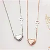 18K ouro rosa titânio aço curto clavícula cadeia simples Coreia do Sul simples em forma de coração colar chave camisola cadeia acessórios