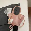 Bolsa transversal estilo balde feminina 2026 nova tendência moderna para atividades ao ar livre com alça de mão primavera toque de luxo bolsa de ombro único