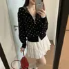 Suéter retro americano de lunares con capucha, sudadera corta para mujer, nuevo estilo otoño e invierno, chaqueta cárdigan de punto dulce y atrevida para mujer