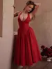 Vestido de Verano 2025 Europeo y Americano Nuevo para Mujer Sexy de Cuello Halter Escote en V Profundo Sin Mangas Falda de Longitud Media Color Puro Ajustado Espalda Descubierta