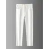 Jeans Blancos de Alta Gama Estilo Europeo a Prueba de Tres Elementos para Hombre, Corte Delgado, Elásticos, Pantalones Cónicos, Versión Forrada de Felpa Otoño e Invierno 2026, Cálidos