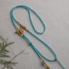 Collar de Cuerda con Lazo de Flor de Durazno Tejido a Mano Cuerda de Ocho Hilos Colgante Lateral Cruzado Cordón Colgante de Buda Dorado