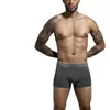 Ropa interior de hombre de algodón puro hecha a medida para exportación, entrepierna antibacteriana, calzoncillos tipo bóxer cómodos, empaque de caja de regalo de alta gama