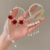 Clip de coleta de aleación con borla de lirio del valle, nuevo para la primavera de 2025, accesorio para el cabello estilo Mori para mujer, pasador para moño dulce