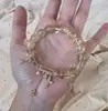 Pulsera de Cruz con Perlas Amarillas Simple Coreana, Fresca, Ligera, Lujosa y de Alta Gama, Pulsera Suave y de Moda