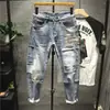 Pantalones vaqueros rotos con parches para hombre, estilo coreano, con costuras hasta el tobillo, de primavera y otoño, de nueva marca de moda, informales, ajustados y combinables.