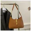 2026 Bolso de Hombro Simple de Color Sólido Nuevo Hebilla Exquisita Bolso de Hombro Único de Moda Versátil Coreano Bolso de Hombro de Mano