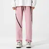Calle principal americana Pu Shuai pantalones de montaña con cremallera para hombre primavera y otoño marca de moda al aire libre tres pruebas holgados casuales