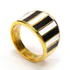Anillo de titanio con rayas de goteo en blanco y negro retro creativo ins europeo y americano para mujer, anillo de dedo índice de nicho de alta gama a la moda, chapado en oro