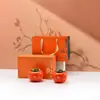 Creative Tea pot cerâmica Caqui doces Caqui Ruyi selado tamanho pequeno conjunto de chá caixa de presente latas duplas embalagem presente