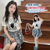 Traje de Falda de Manga Corta de Verano para Niñas 2026 Nuevo Estilo Moda Infantil Falda a Cuadros Asimétrica Conjunto de Dos Piezas Transfronterizo