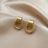 Pendientes de aro geométricos de círculo retro con explosiones transfronterizas, pendientes de botón de anillo metálico de múltiples capas, estilo frío de celebridad de internet