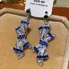 Pendientes de Flor de Perla con Circonita Incrustada de Diamantes de Lujo, Pendientes de Moda de Lujo Ligero y Gama Alta, Pendientes de Estilo Europeo y Americano con un Diseño de Nicho
