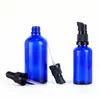 Xm0571 Frasco de Vidro Redondo Cosmético Azul Frasco com Bomba para Loção Frasco Vazio para Essência de Skincare Óleo Capilar Feito Sob Medida